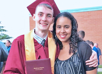   Education ReConnection student poses with teacher Onika Powell after graduation ceremony.